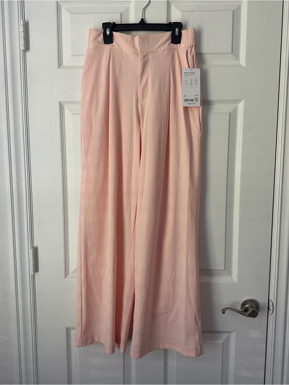 Athleta Pinnacle High Rise Trouser in the shade Pink Sand Size 4